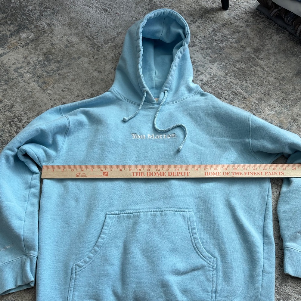 baby blue You Matter hoodie by Demetrius Harmon